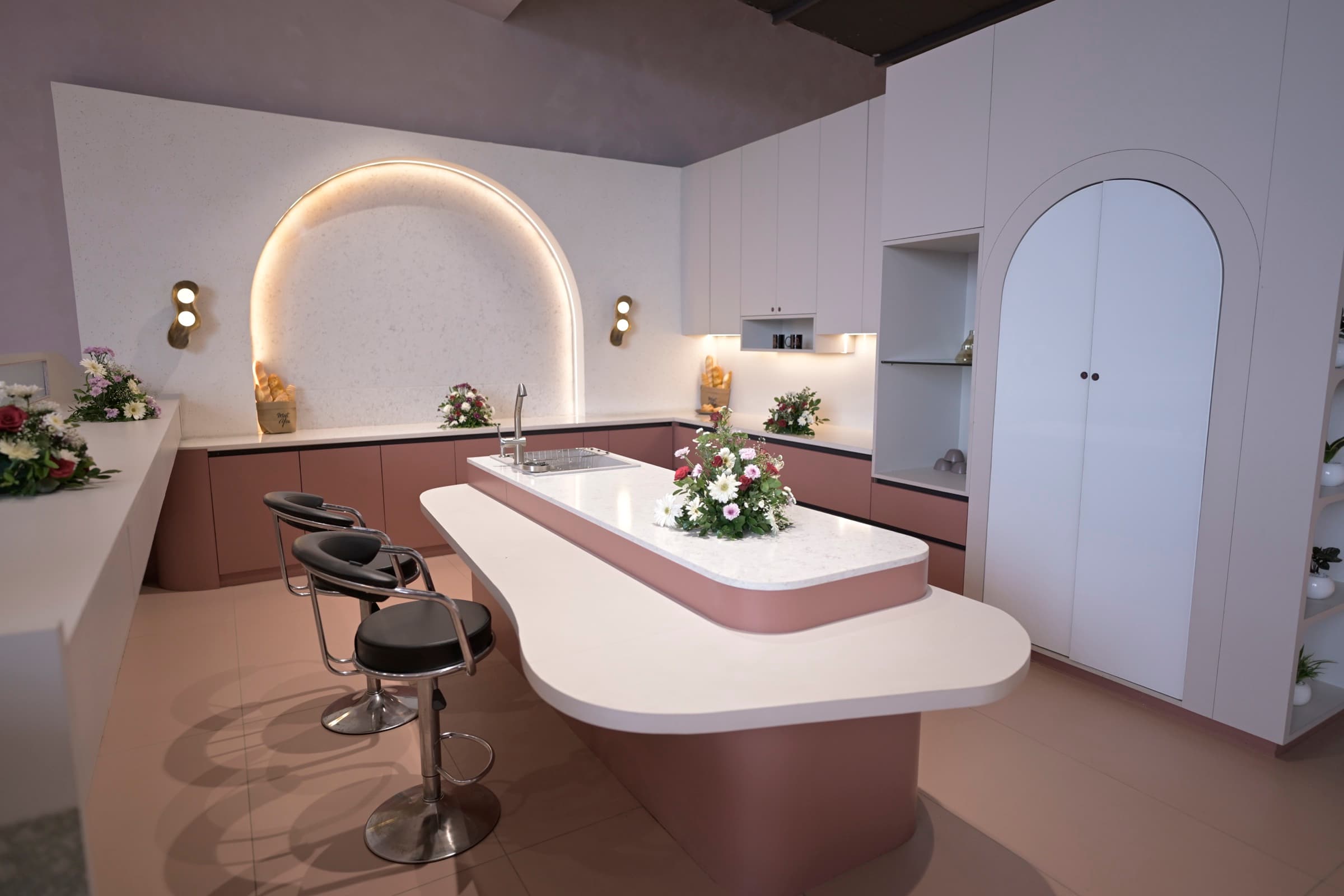 EBONY bespoke island kitchen with fluted detailing and quartz countertop