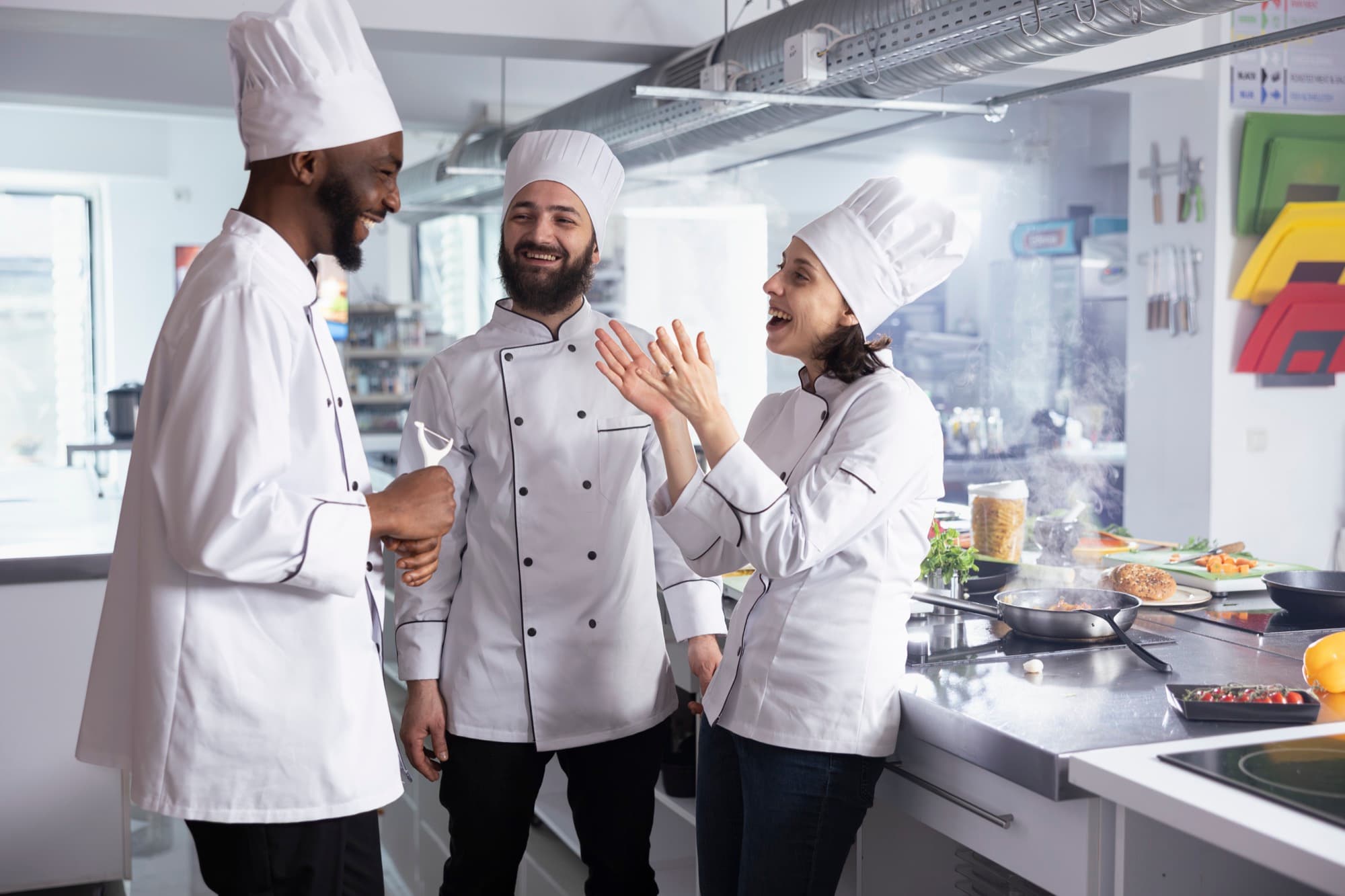A team of chefs working together in a commercial kitchen